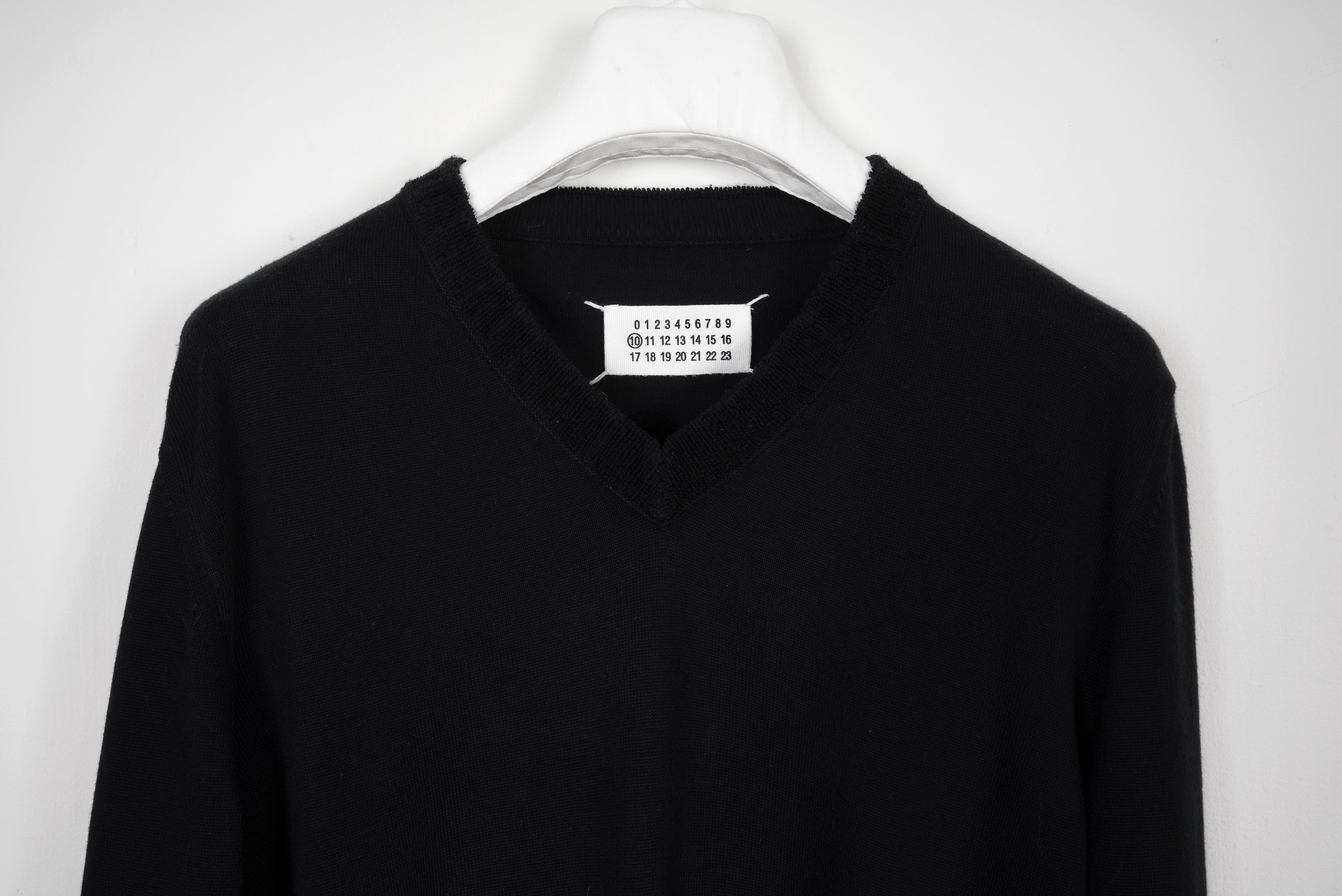 2010 S/S BLACK SWEATER WITH FROTTÉ NECK DETAIL