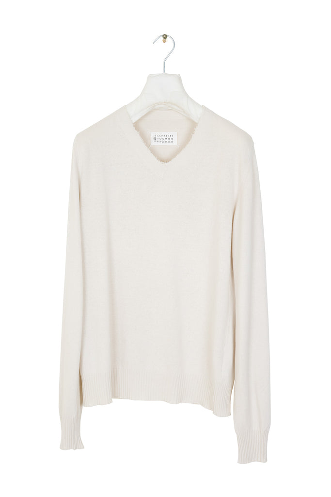 2006 S/S CREAM SWEATER WITH RIPPED NECKLINE DETAIL