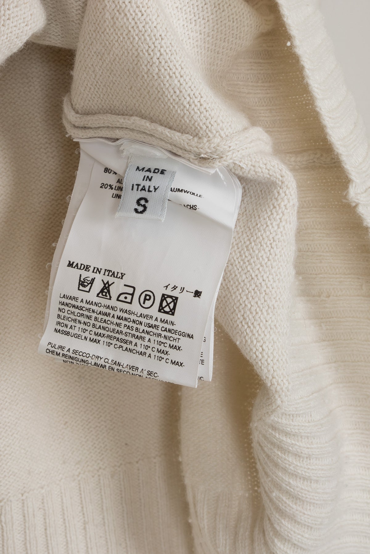 2006 S/S CREAM SWEATER WITH RIPPED NECKLINE DETAIL